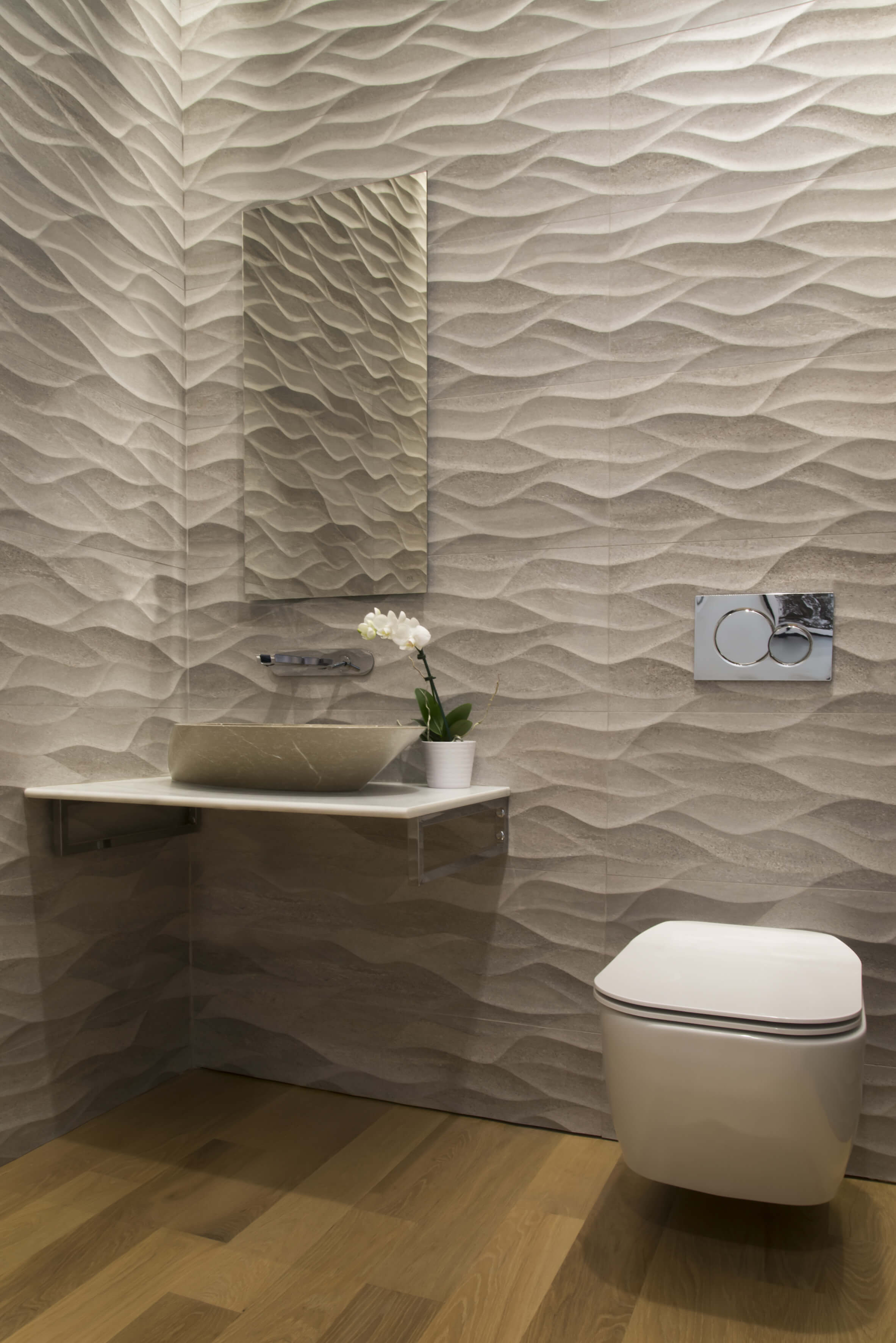 Custom contemporary bathroom with textured Porcelanosa tile designed by Interior Designer RM Interiors.