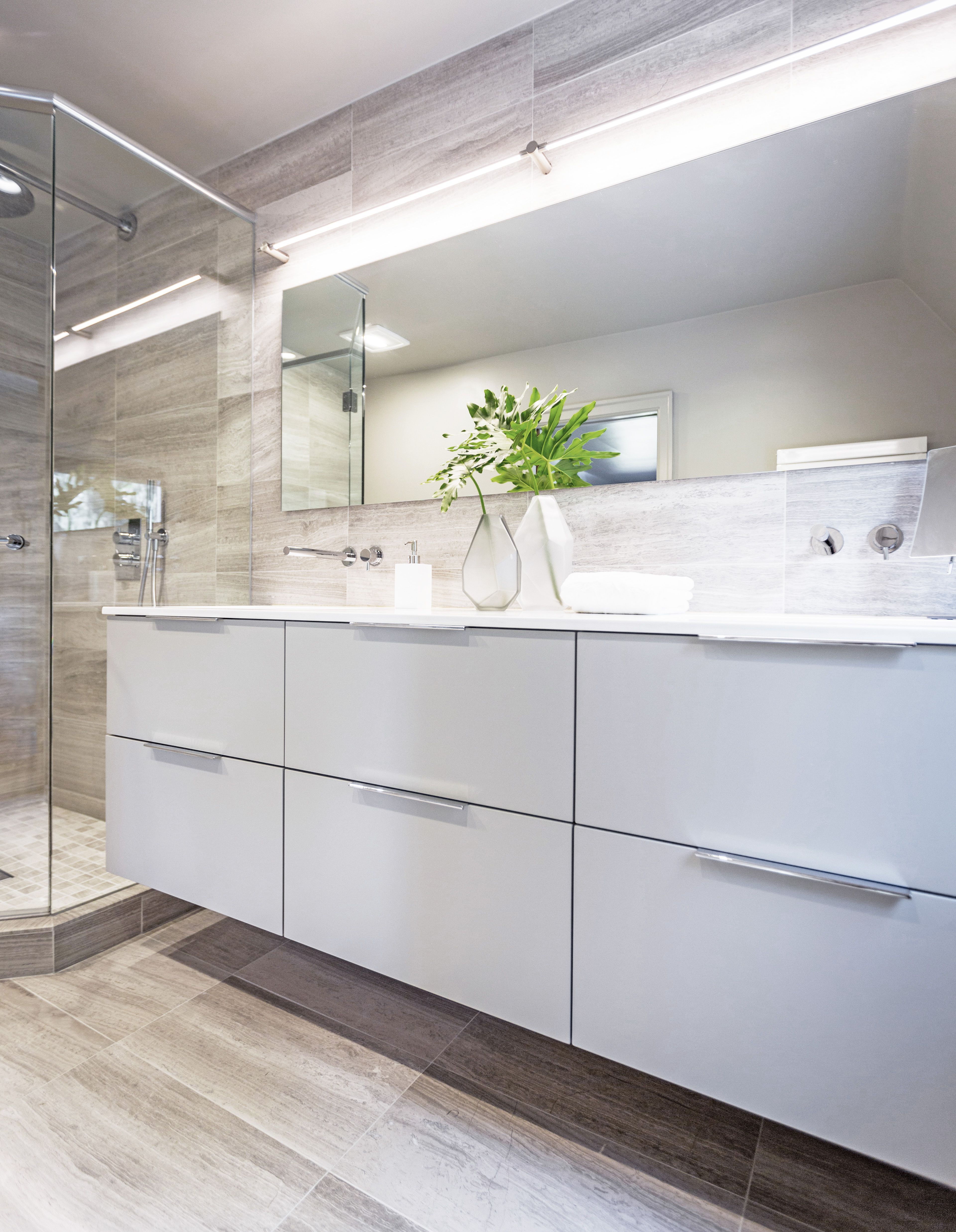 Contemporary bathroom remodel with custom cabinets designed by Cincinnati Interior Designer, RM Interiors.